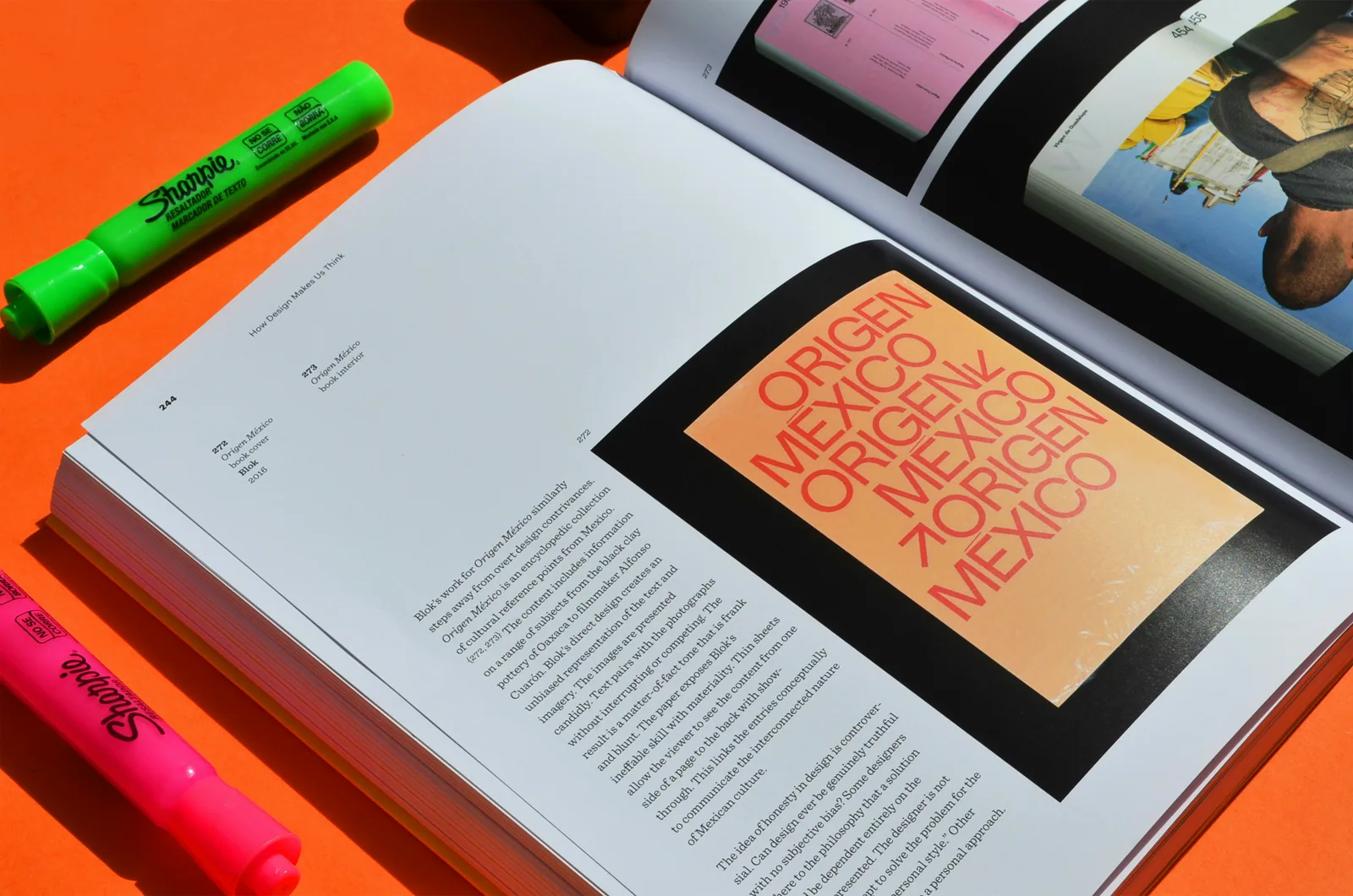 A book opened to a page with markers on it