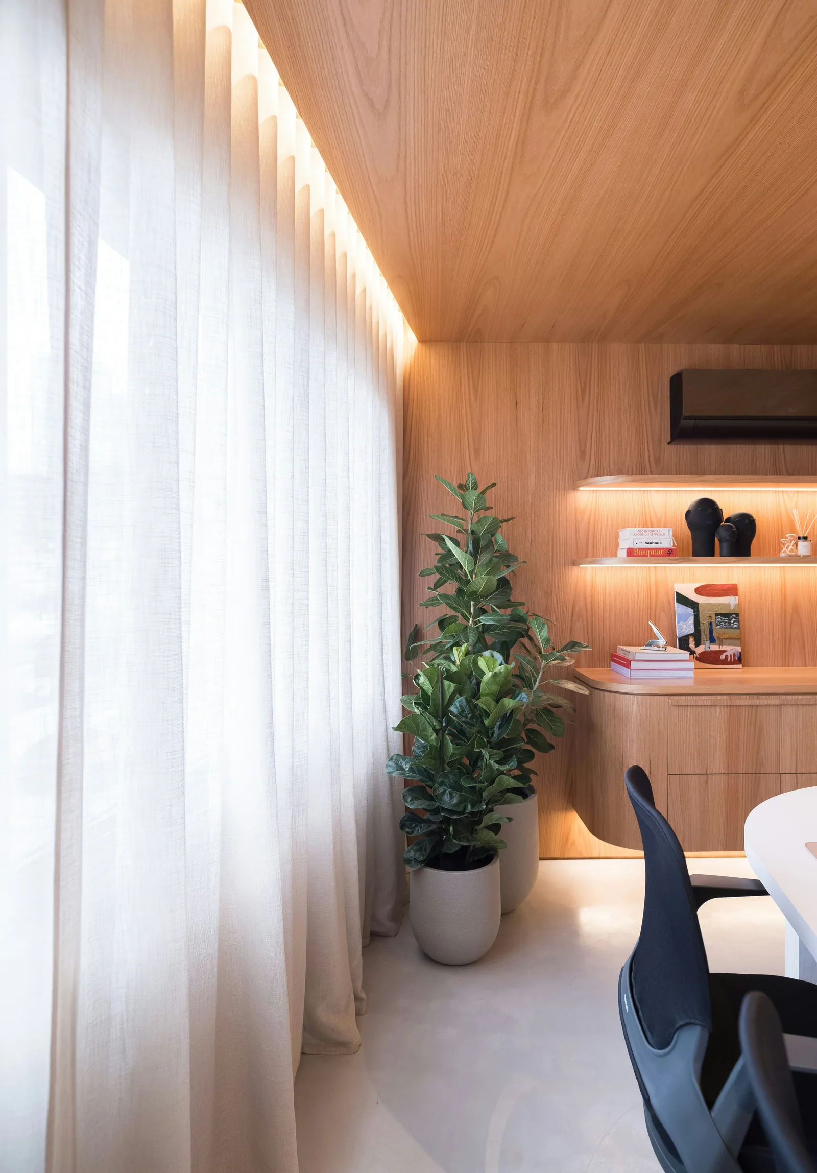 Modern room with wood paneling and large windows