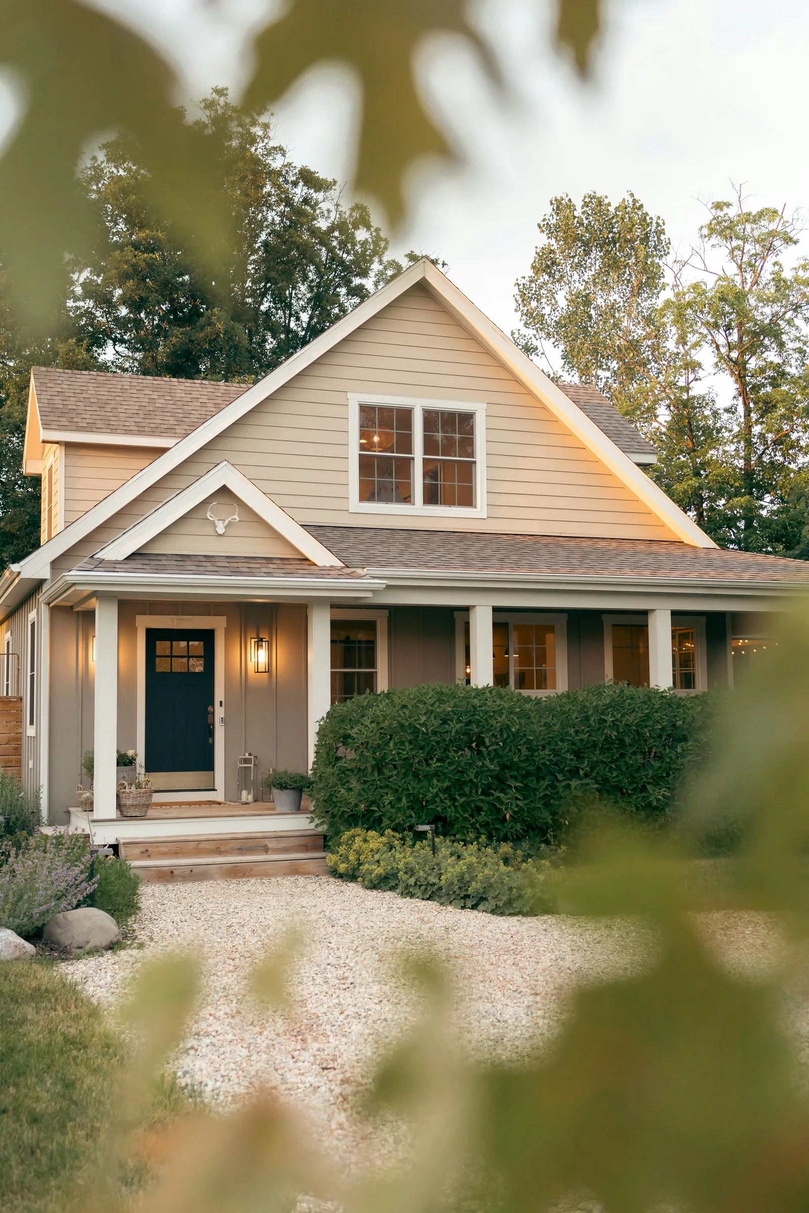 A house with a blue front door and a brown front door