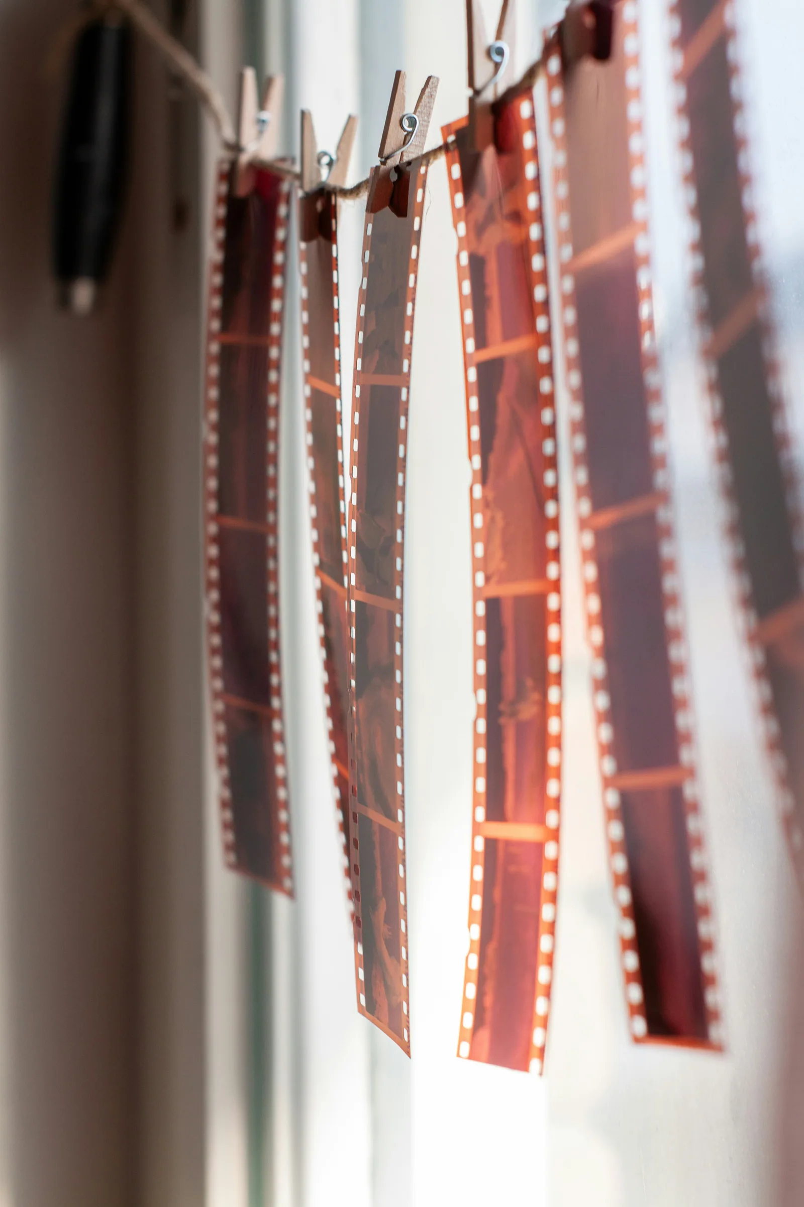 A film strip hanging from a clothes line