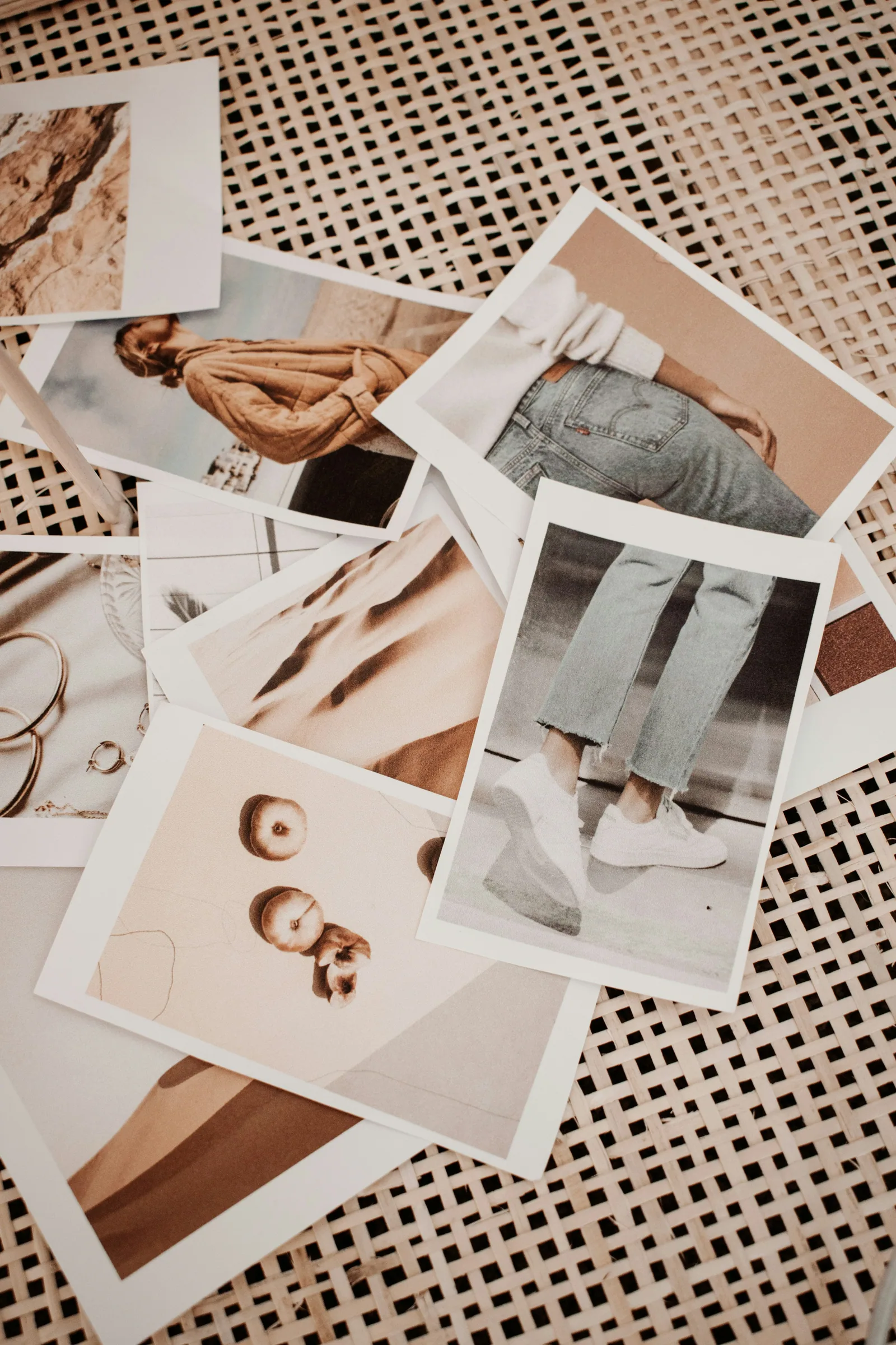 Soft, pale prints scattered on a woven table