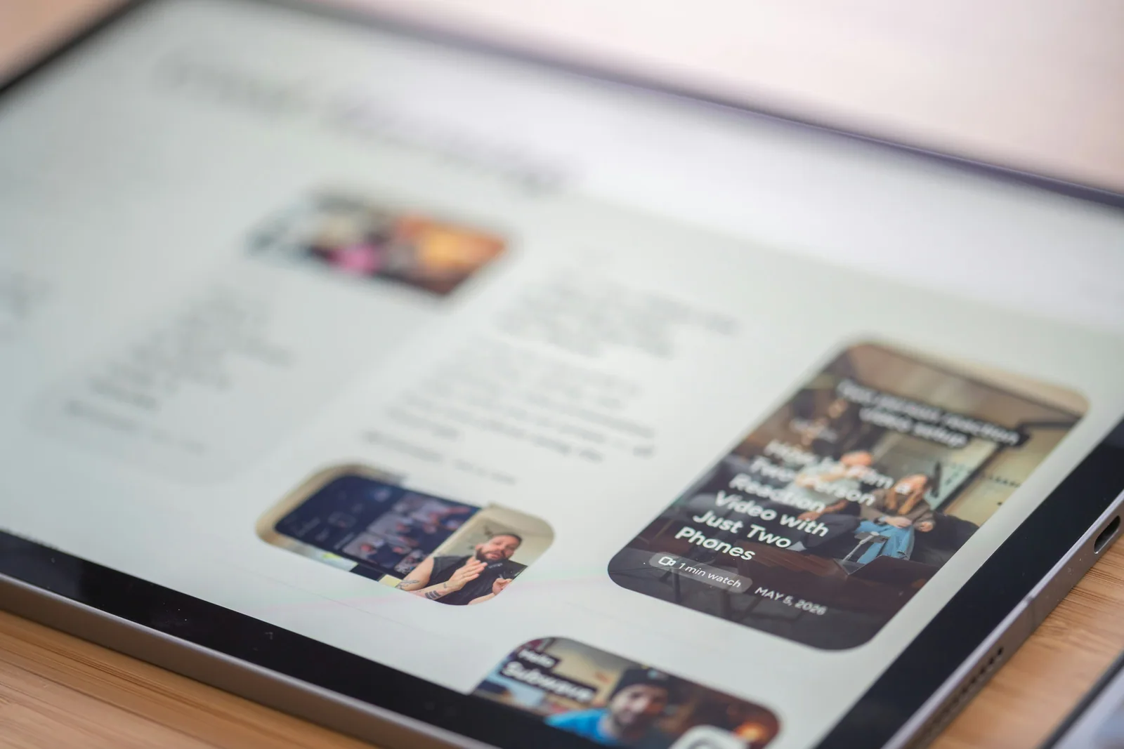 A tablet showing a photo-led website